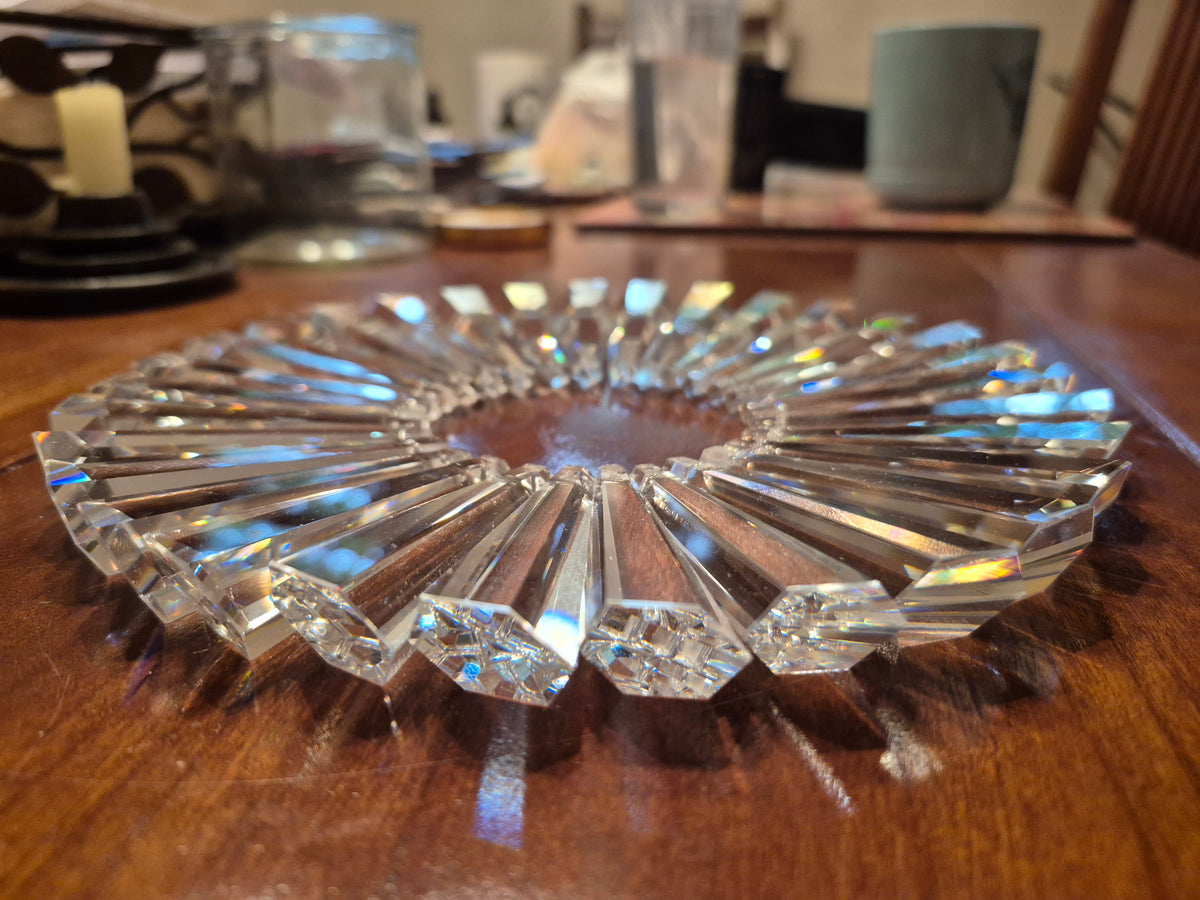 a low oblique view of the hexagon shaped tapered prisms used for this masterpiece of a prism suncatcher.