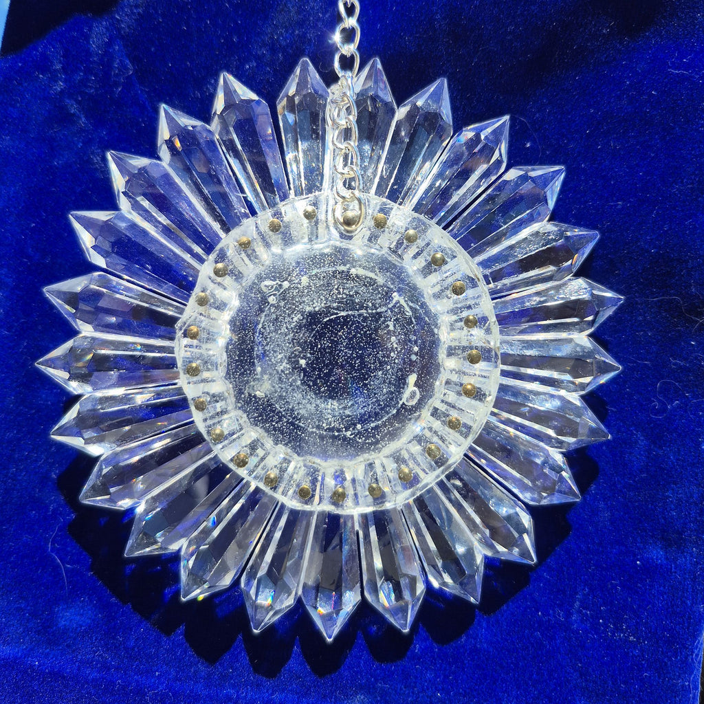back side of 5-inch prism suncatcher on blue