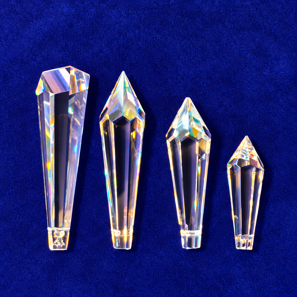 four different chandelier prisms used to make SunRain prism suncatchers